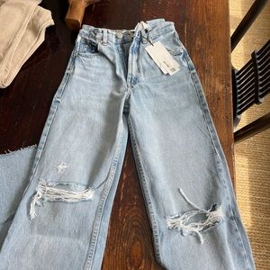 Zara wide leg ripped jeans brand new with the tags still on!!!!